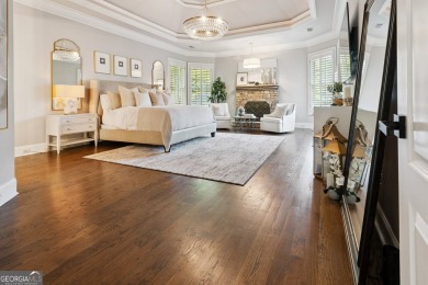 Privately tucked behind a long, tree-lined driveway and greeted on Chateau Elan Golf Club  in Georgia - for sale on GolfHomes.com, golf home, golf lot