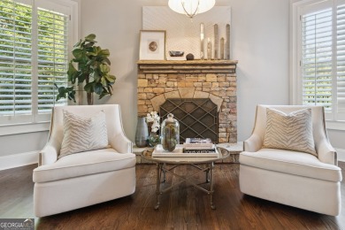 Privately tucked behind a long, tree-lined driveway and greeted on Chateau Elan Golf Club  in Georgia - for sale on GolfHomes.com, golf home, golf lot