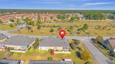 Who wishes half of their HOA fees could be paid for the first 2 on Cape Fear National At Brunswick Forest in North Carolina - for sale on GolfHomes.com, golf home, golf lot