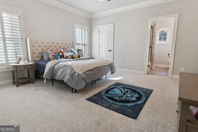 Privately tucked behind a long, tree-lined driveway and greeted on Chateau Elan Golf Club  in Georgia - for sale on GolfHomes.com, golf home, golf lot