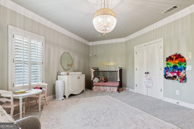 Privately tucked behind a long, tree-lined driveway and greeted on Chateau Elan Golf Club  in Georgia - for sale on GolfHomes.com, golf home, golf lot