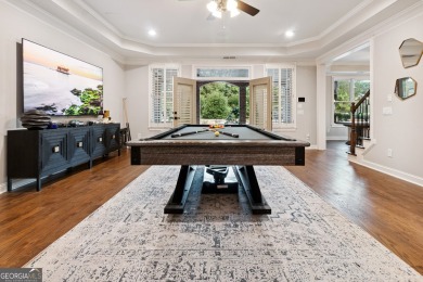Privately tucked behind a long, tree-lined driveway and greeted on Chateau Elan Golf Club  in Georgia - for sale on GolfHomes.com, golf home, golf lot