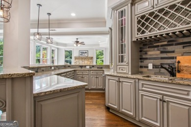 Privately tucked behind a long, tree-lined driveway and greeted on Chateau Elan Golf Club  in Georgia - for sale on GolfHomes.com, golf home, golf lot