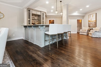 Privately tucked behind a long, tree-lined driveway and greeted on Chateau Elan Golf Club  in Georgia - for sale on GolfHomes.com, golf home, golf lot