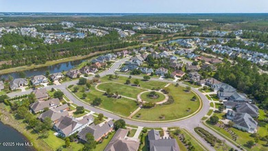 Who wishes half of their HOA fees could be paid for the first 2 on Cape Fear National At Brunswick Forest in North Carolina - for sale on GolfHomes.com, golf home, golf lot