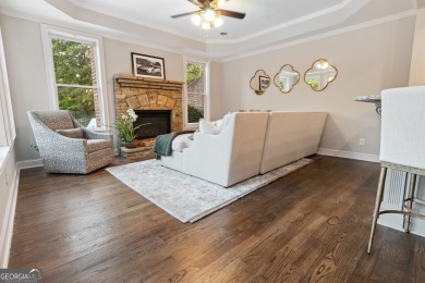 Privately tucked behind a long, tree-lined driveway and greeted on Chateau Elan Golf Club  in Georgia - for sale on GolfHomes.com, golf home, golf lot