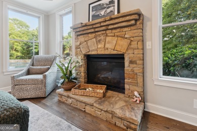 Privately tucked behind a long, tree-lined driveway and greeted on Chateau Elan Golf Club  in Georgia - for sale on GolfHomes.com, golf home, golf lot