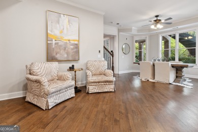 Privately tucked behind a long, tree-lined driveway and greeted on Chateau Elan Golf Club  in Georgia - for sale on GolfHomes.com, golf home, golf lot