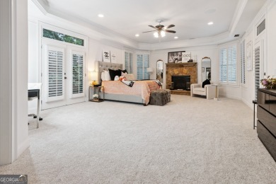 Privately tucked behind a long, tree-lined driveway and greeted on Chateau Elan Golf Club  in Georgia - for sale on GolfHomes.com, golf home, golf lot