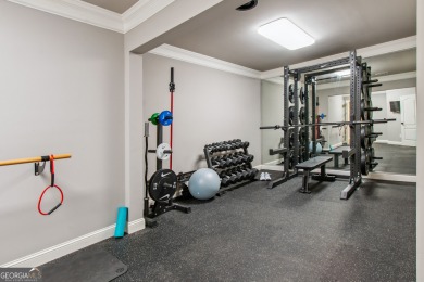 Privately tucked behind a long, tree-lined driveway and greeted on Chateau Elan Golf Club  in Georgia - for sale on GolfHomes.com, golf home, golf lot