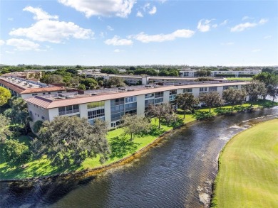 Renovated 1st Floor Condo with Water & Golf Course Views in on Wynmoor Golf Course in Florida - for sale on GolfHomes.com, golf home, golf lot