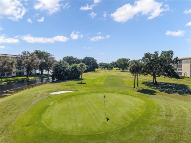 Renovated 1st Floor Condo with Water & Golf Course Views in on Wynmoor Golf Course in Florida - for sale on GolfHomes.com, golf home, golf lot