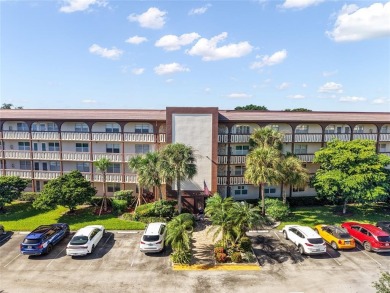 Renovated 1st Floor Condo with Water & Golf Course Views in on Wynmoor Golf Course in Florida - for sale on GolfHomes.com, golf home, golf lot