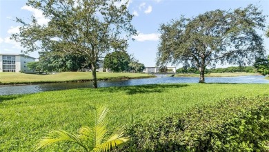 Renovated 1st Floor Condo with Water & Golf Course Views in on Wynmoor Golf Course in Florida - for sale on GolfHomes.com, golf home, golf lot