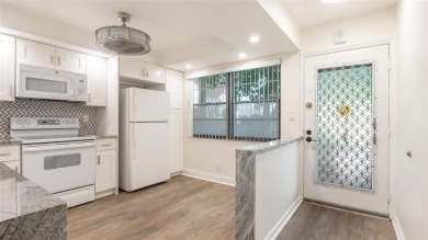 Renovated 1st Floor Condo with Water & Golf Course Views in on Wynmoor Golf Course in Florida - for sale on GolfHomes.com, golf home, golf lot