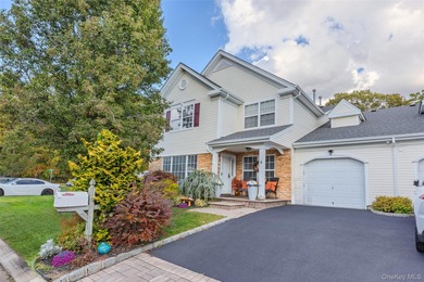 This tastefully remodeled townhome was designed with style and on Birchwood at Spring Lake in New York - for sale on GolfHomes.com, golf home, golf lot
