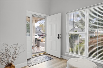 This tastefully remodeled townhome was designed with style and on Birchwood at Spring Lake in New York - for sale on GolfHomes.com, golf home, golf lot