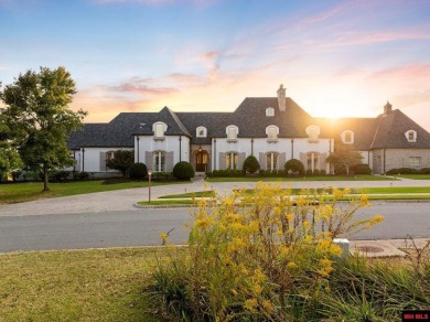 Welcome to your dream retreat! This exquisite Country French on Big Creek Golf and Country Club in Arkansas - for sale on GolfHomes.com, golf home, golf lot