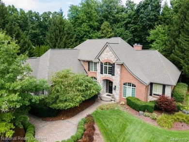 This custom property is tucked away on a quiet cul-de-sac is in on Oakhurst Golf and Country Club in Michigan - for sale on GolfHomes.com, golf home, golf lot