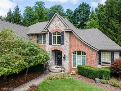 This custom property is tucked away on a quiet cul-de-sac is in on Oakhurst Golf and Country Club in Michigan - for sale on GolfHomes.com, golf home, golf lot