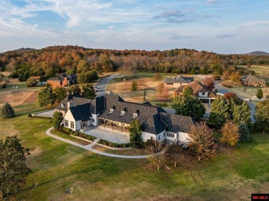 Welcome to your dream retreat! This exquisite Country French on Big Creek Golf and Country Club in Arkansas - for sale on GolfHomes.com, golf home, golf lot