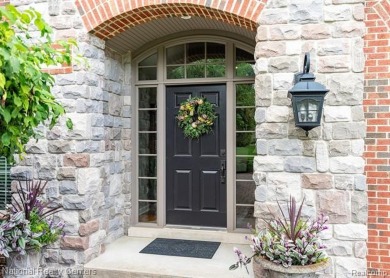 This custom property is tucked away on a quiet cul-de-sac is in on Oakhurst Golf and Country Club in Michigan - for sale on GolfHomes.com, golf home, golf lot