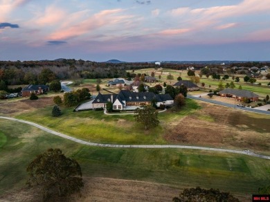 Welcome to your dream retreat! This exquisite Country French on Big Creek Golf and Country Club in Arkansas - for sale on GolfHomes.com, golf home, golf lot