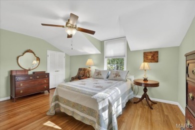 Welcome to your dream home! Nestled on a spacious, park-like lot on Greenbriar Hills Country Club in Missouri - for sale on GolfHomes.com, golf home, golf lot