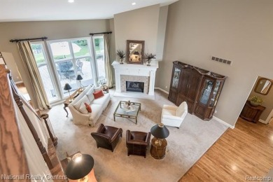This custom property is tucked away on a quiet cul-de-sac is in on Oakhurst Golf and Country Club in Michigan - for sale on GolfHomes.com, golf home, golf lot