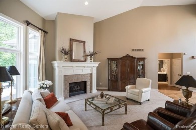This custom property is tucked away on a quiet cul-de-sac is in on Oakhurst Golf and Country Club in Michigan - for sale on GolfHomes.com, golf home, golf lot