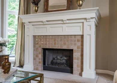 This custom property is tucked away on a quiet cul-de-sac is in on Oakhurst Golf and Country Club in Michigan - for sale on GolfHomes.com, golf home, golf lot