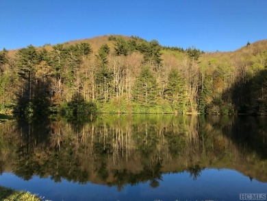 Between two North Carolina mountain ridges lies an expansive on Headwaters Golf Club in North Carolina - for sale on GolfHomes.com, golf home, golf lot
