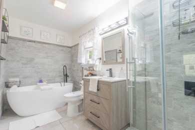 This beautifully renovated 3-bedroom, 3-bathroom home is the on Pocono Farms Country Club in Pennsylvania - for sale on GolfHomes.com, golf home, golf lot