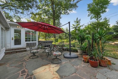 Welcome to your dream home! Nestled on a spacious, park-like lot on Greenbriar Hills Country Club in Missouri - for sale on GolfHomes.com, golf home, golf lot