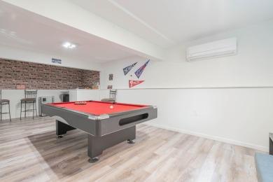 This beautifully renovated 3-bedroom, 3-bathroom home is the on Pocono Farms Country Club in Pennsylvania - for sale on GolfHomes.com, golf home, golf lot