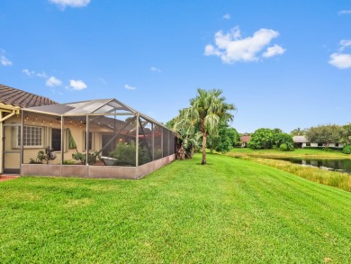 This stunning lakefront home in the highly desirable Elysium on Village Golf Club in Florida - for sale on GolfHomes.com, golf home, golf lot