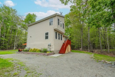This beautifully renovated 3-bedroom, 3-bathroom home is the on Pocono Farms Country Club in Pennsylvania - for sale on GolfHomes.com, golf home, golf lot