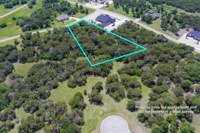 Imagine your dream home tucked within the trees on this over an on The Retreat in Texas - for sale on GolfHomes.com, golf home, golf lot