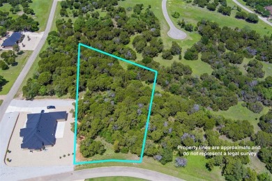 Imagine your dream home tucked within the trees on this over an on The Retreat in Texas - for sale on GolfHomes.com, golf home, golf lot