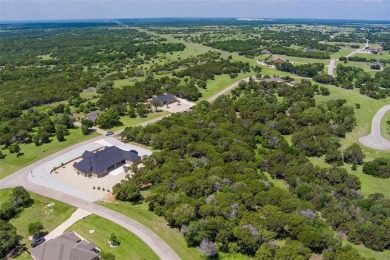 Imagine your dream home tucked within the trees on this over an on The Retreat in Texas - for sale on GolfHomes.com, golf home, golf lot