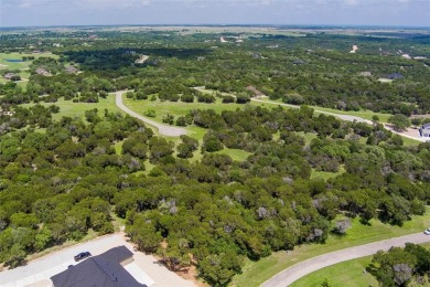 Imagine your dream home tucked within the trees on this over an on The Retreat in Texas - for sale on GolfHomes.com, golf home, golf lot
