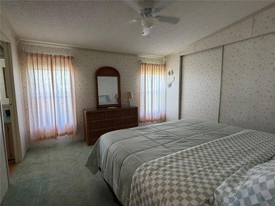2 bedroom 2 bath manufactured home in the 55+ community of on Blue Heron Pines Golf Course in Florida - for sale on GolfHomes.com, golf home, golf lot
