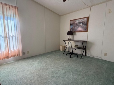 2 bedroom 2 bath manufactured home in the 55+ community of on Blue Heron Pines Golf Course in Florida - for sale on GolfHomes.com, golf home, golf lot