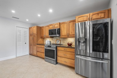 Beautifully renovated 2BR lakefront condo in the sought-after on Deer Creek Golf Club in Florida - for sale on GolfHomes.com, golf home, golf lot