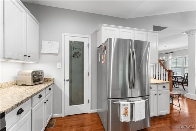 This super cute and lovingly cared for craftsman style, stone on The Westham Golf Club At Magnolia Green in Virginia - for sale on GolfHomes.com, golf home, golf lot