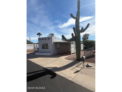 Awesome curb appeal with this furnished north facing home with on Tucson Estates Golf Course in Arizona - for sale on GolfHomes.com, golf home, golf lot