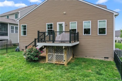 This super cute and lovingly cared for craftsman style, stone on The Westham Golf Club At Magnolia Green in Virginia - for sale on GolfHomes.com, golf home, golf lot