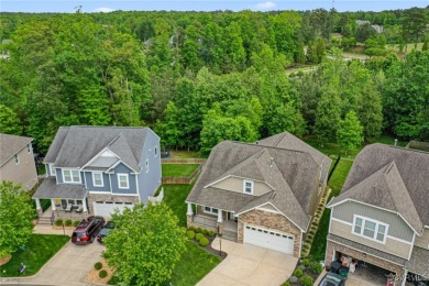 This super cute and lovingly cared for craftsman style, stone on The Westham Golf Club At Magnolia Green in Virginia - for sale on GolfHomes.com, golf home, golf lot