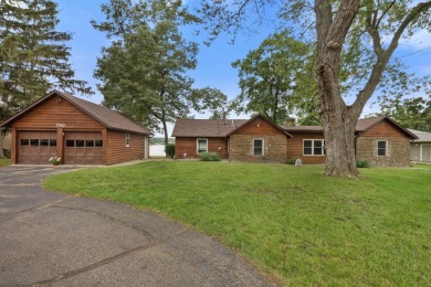 Rare opportunity on all-sports Goguac Lake! This 3-bedroom, 2 on Battle Creek Country Club in Michigan - for sale on GolfHomes.com, golf home, golf lot