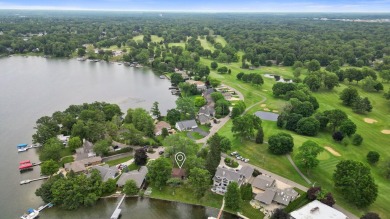 Rare opportunity on all-sports Goguac Lake! This 3-bedroom, 2 on Battle Creek Country Club in Michigan - for sale on GolfHomes.com, golf home, golf lot